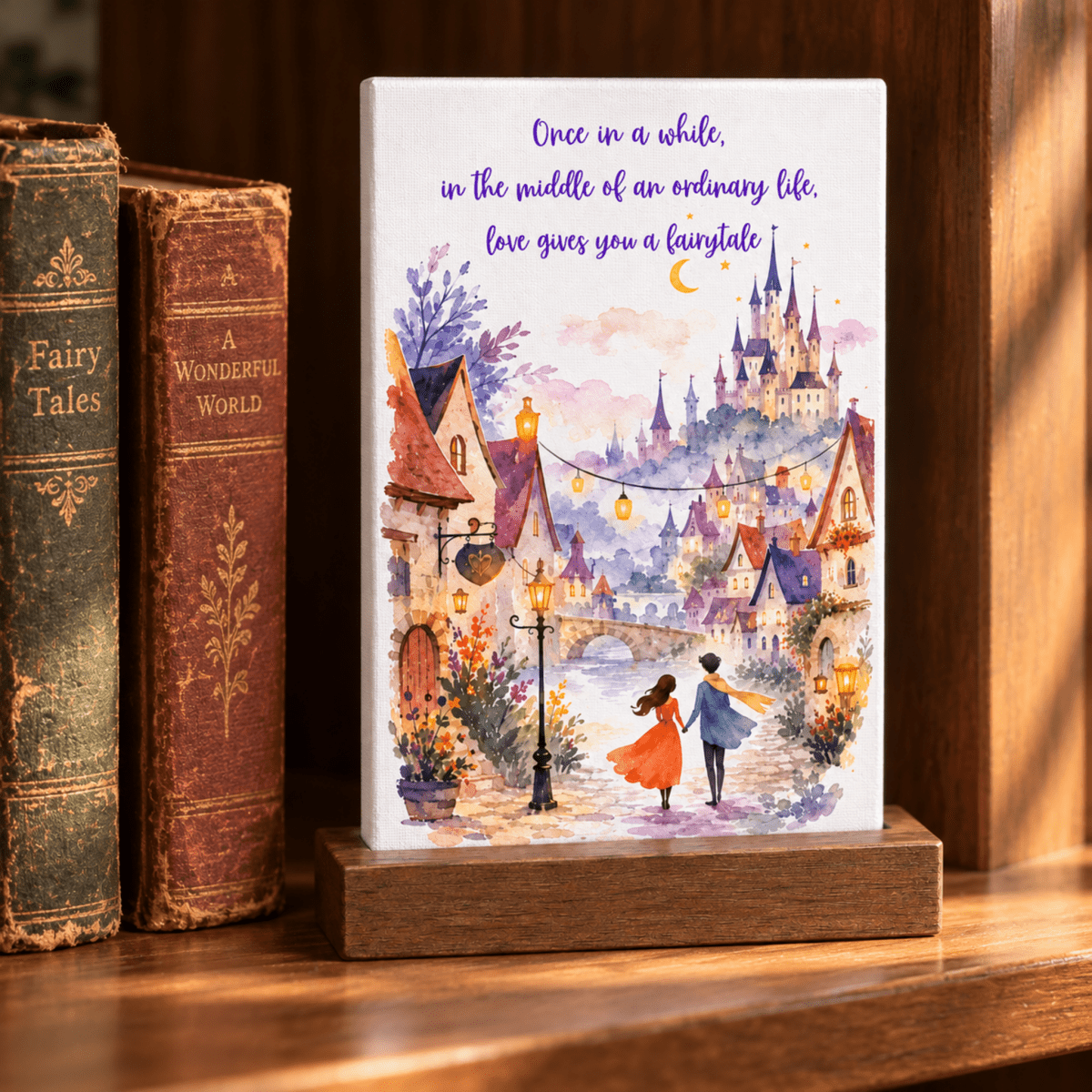 A Love Gives You a Fairytale Mini Canvas Sign featuring a watercolor illustration of a couple walking toward a fairy-tale castle, with the text “Once in a while, in the middle of an ordinary life, love gives you a fairytale” at the top.