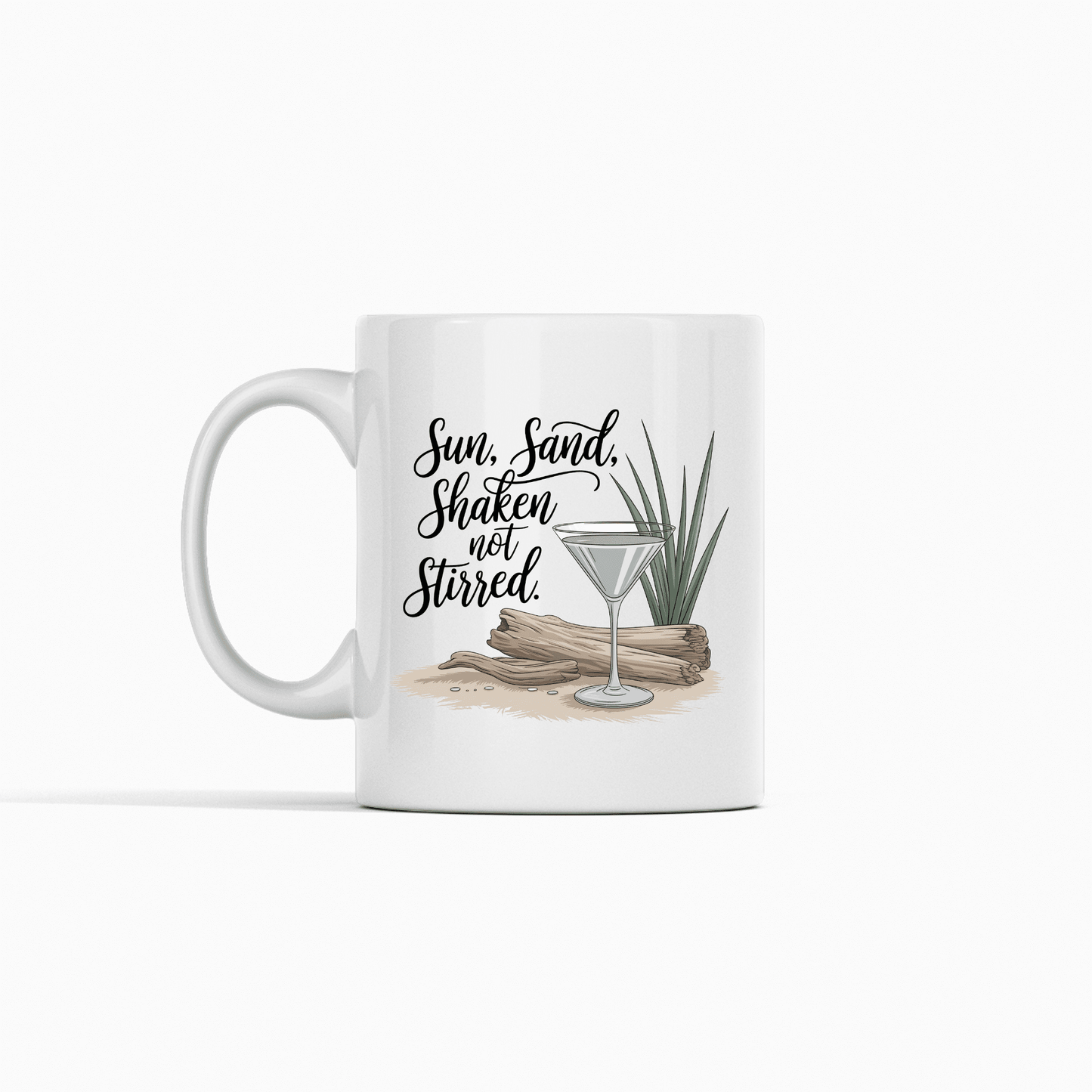 The Sun, Sand, Shaken Not Stirred Mug – Coastal Coffee Vibe by Mirabilia Boutique features driftwood, a green plant, sand, and a martini glass with the phrase “Sun, Sand, Shaken not Stirred.” Perfect for beach house decor. White background.