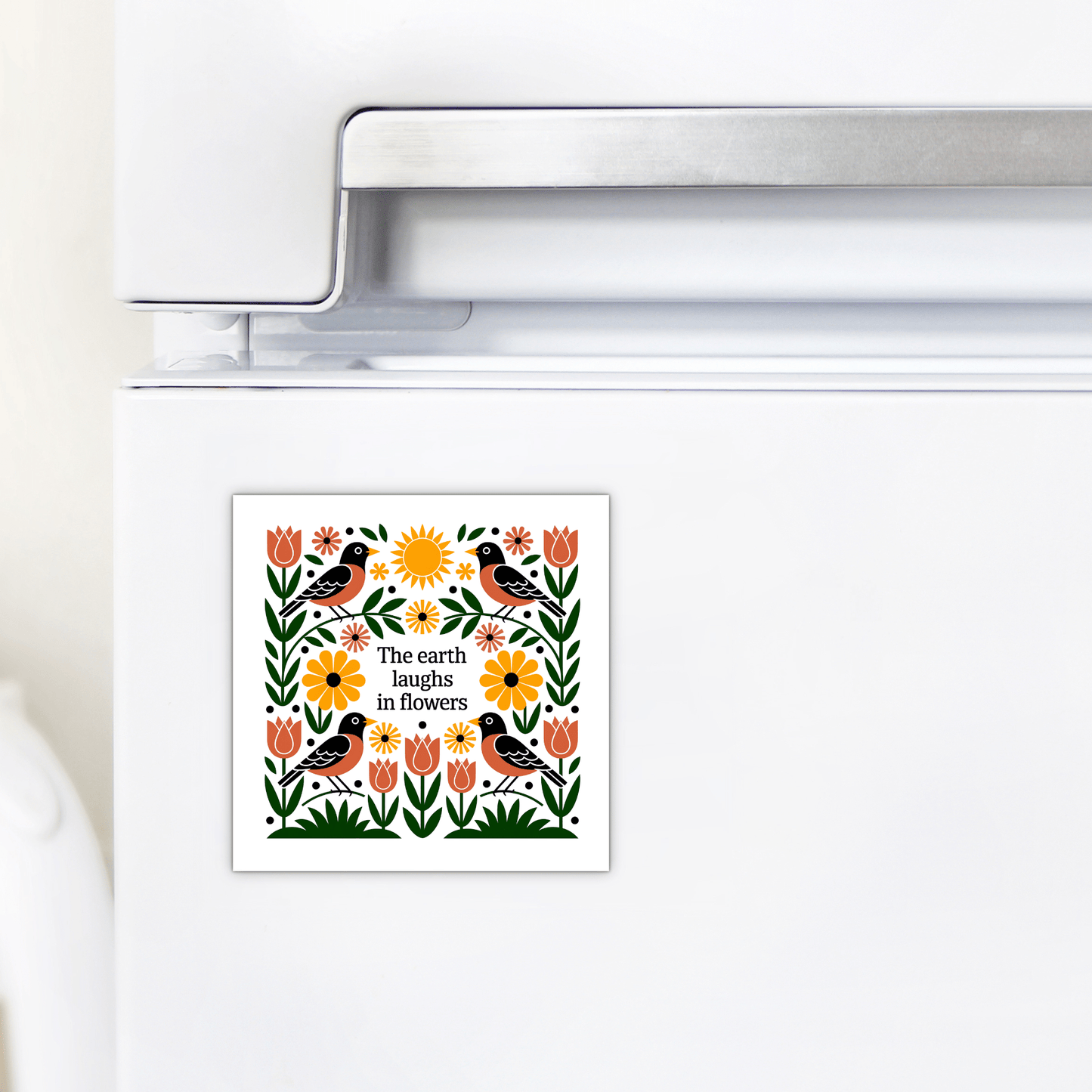 The Earth Laughs in Flowers Floral Magnet by Mirabilia Boutique showcases vibrant flowers and birds with the quote "The earth laughs in flowers," adding garden-inspired charm to your fridge.