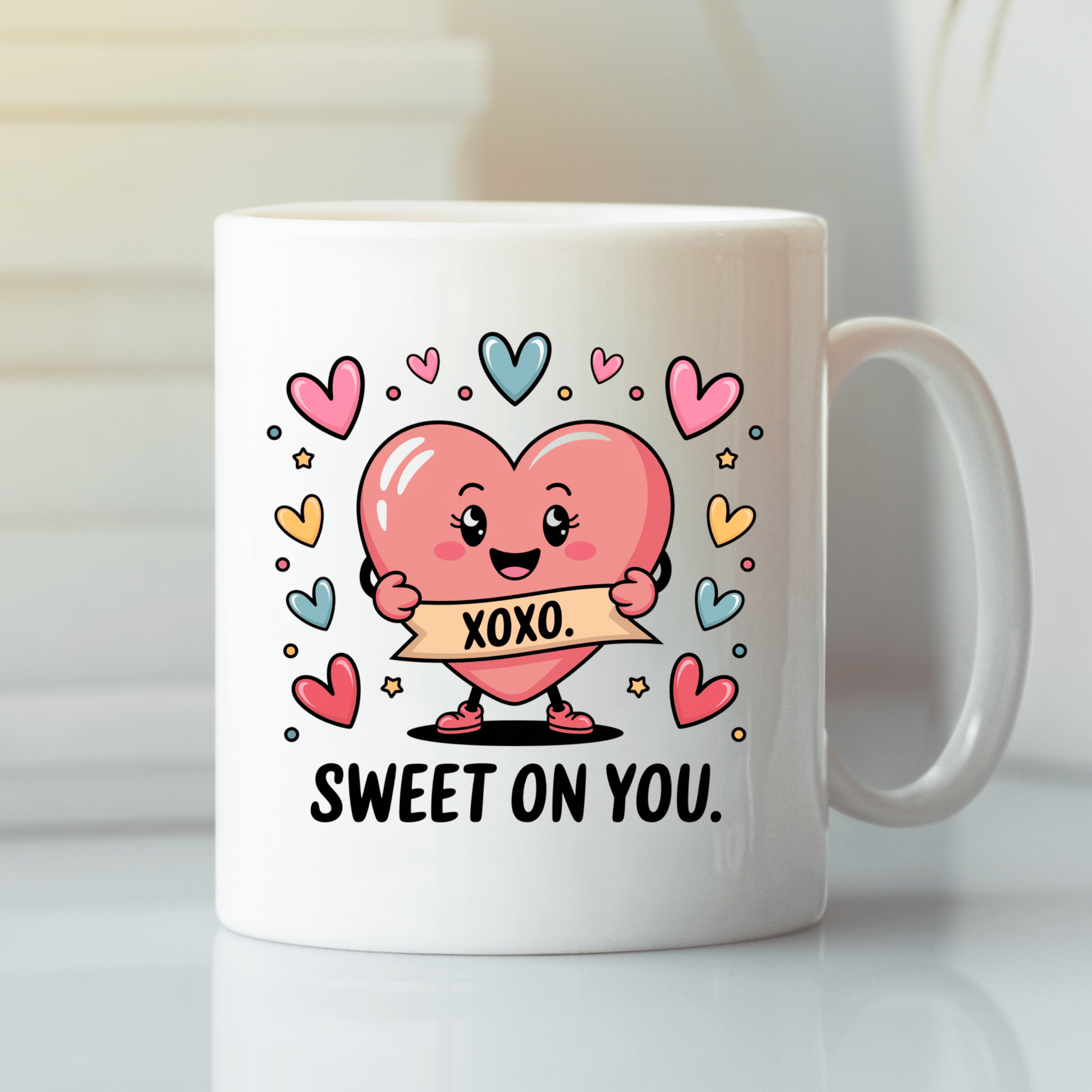 The Sweet On You Heart Mug by Mirabilia Boutique features a cute pink heart with an "XOXO" banner, surrounded by colorful hearts and stars, plus "SWEET ON YOU" text—making it the perfect cute Valentine’s gift for someone special.