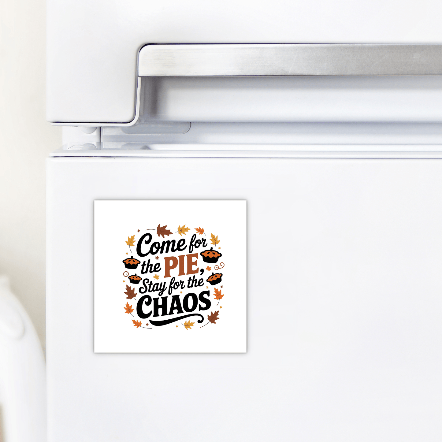 Add a playful touch to your kitchen with the Mirabilia Boutique Pie & Chaos Fall Fridge Decor—a white square Thanksgiving magnet that reads "Come for the pie, stay for the chaos," with autumn leaves and pies. A unique holiday gift!.