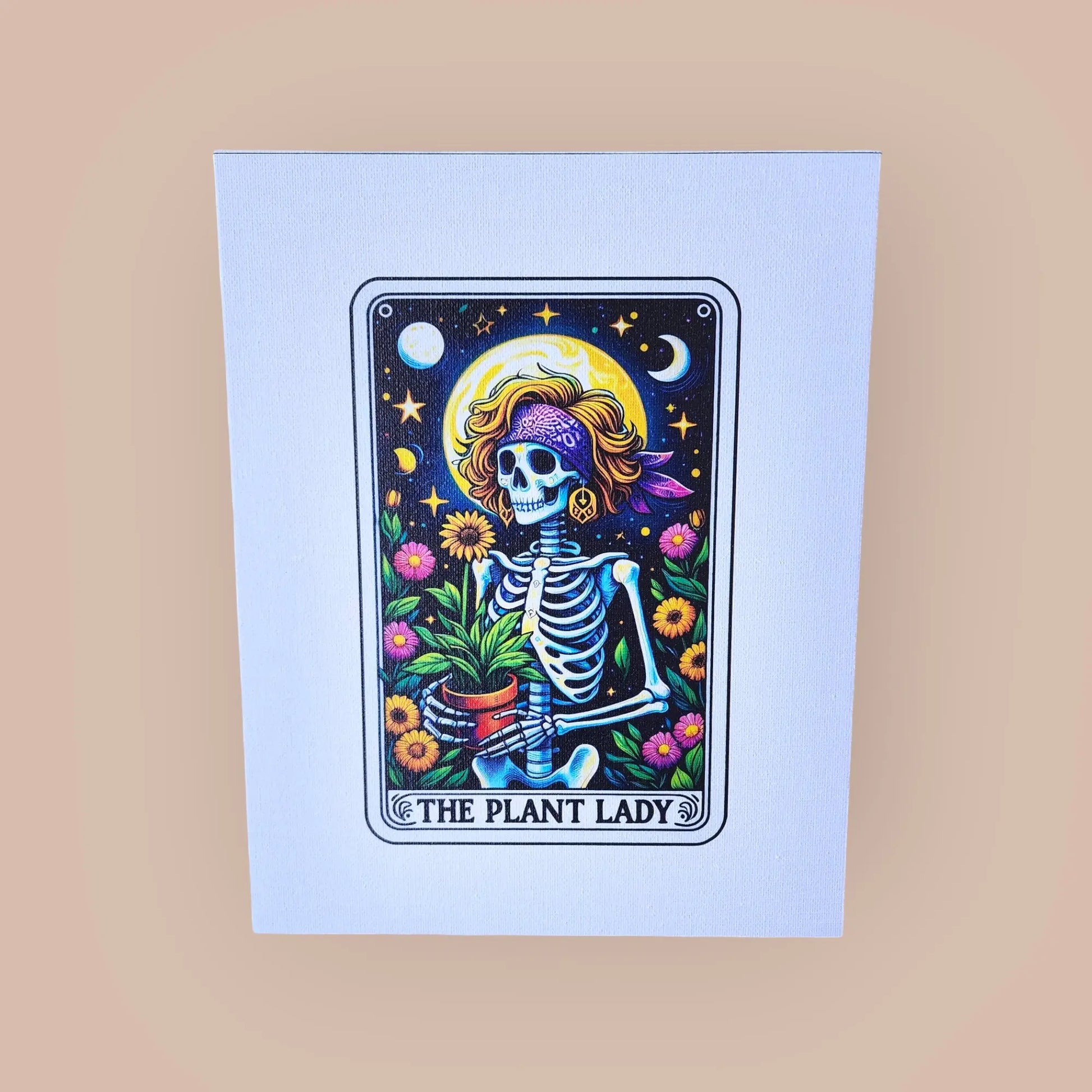 A colorful illustration of a whimsical skeleton dressed as a woman, holding a potted plant, surrounded by various plants and flowers. The background features a night sky with stars and the moon. Text at the bottom reads "The Plant Lady." This enchanting Mirabilia Boutique *The Plant Lady Gardening 8x10 Canvas Sign* is set on a light beige background.