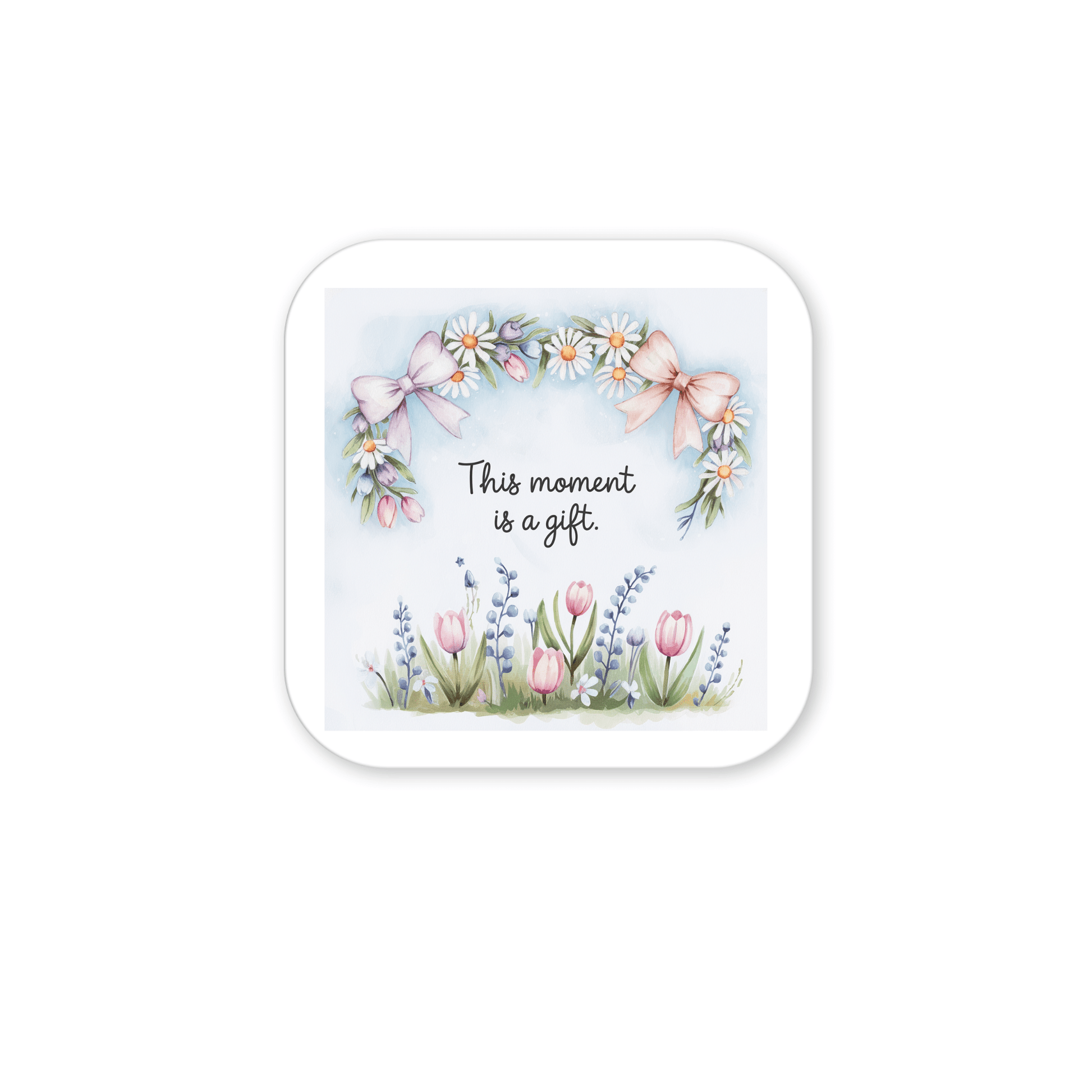 The "This Moment Is a Gift Magnet – Floral Spring Quote" by Mirabilia Boutique features pink bows, daisies, and tulips with the message "This moment is a gift." Its soft pastel design makes it an uplifting, inspirational gift.