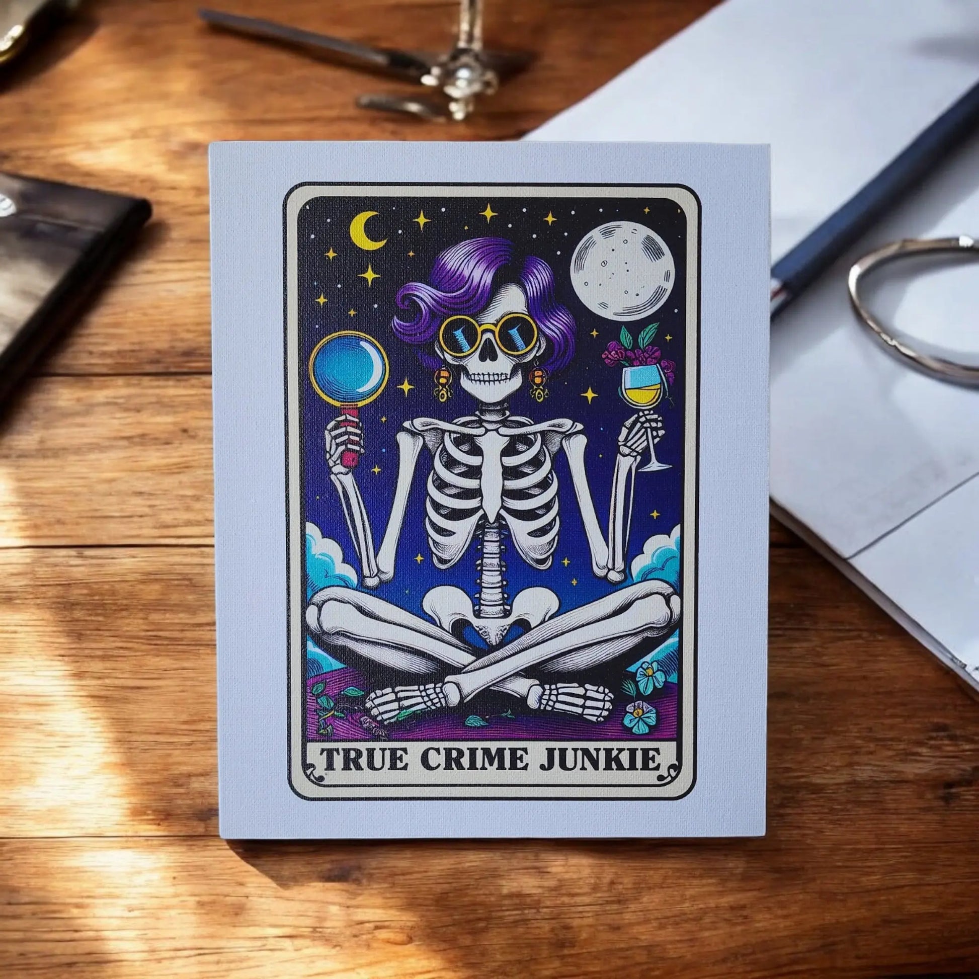 The Mirabilia Boutique's "True Crime Junkie Funny 8x10 Canvas Sign" displays a cartoon skeleton with purple hair, sunglasses, and clothes, holding a magnifying glass and a wine glass. Set against a night sky backdrop with a crescent moon and stars, the text at the bottom reads "TRUE CRIME JUNKIE." Perfect for framing to enhance any True Crime decor.