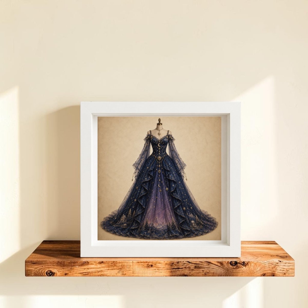 Under The Turning Stars | Curated Couture Artwork by Mirabilia Boutique features a framed depiction of an ornate, dark blue ball gown adorned with gold star patterns, displayed on a wooden shelf against a beige wall and bathed in gentle sunlight—an exquisite piece of collectible canvas art to elevate any space.