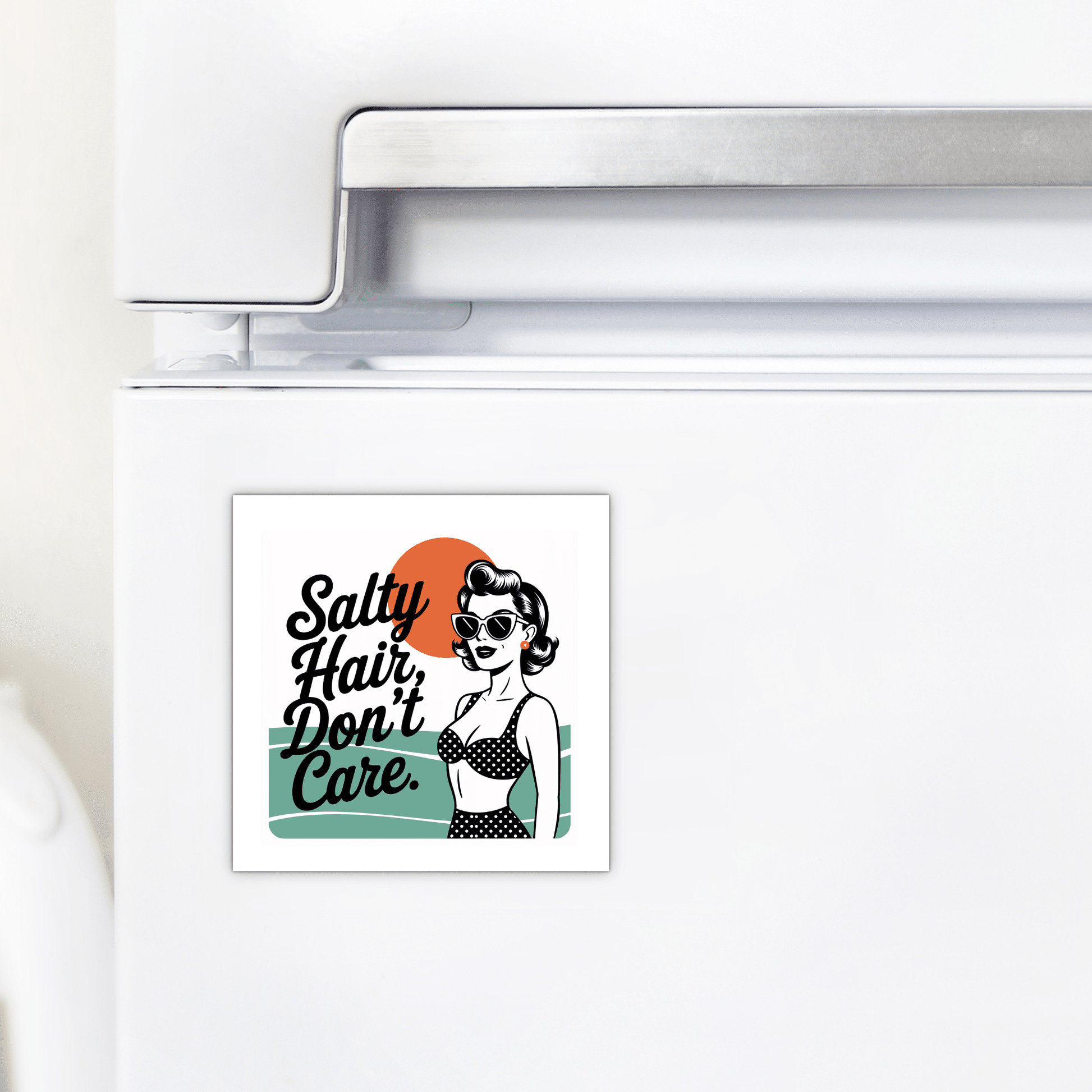 The Mirabilia Boutique Salty Hair Don’t Care Magnet features a retro beach design with a woman in sunglasses, a polka dot bikini, and an orange sun—perfect for adding playful style to your fridge or beach house decor.