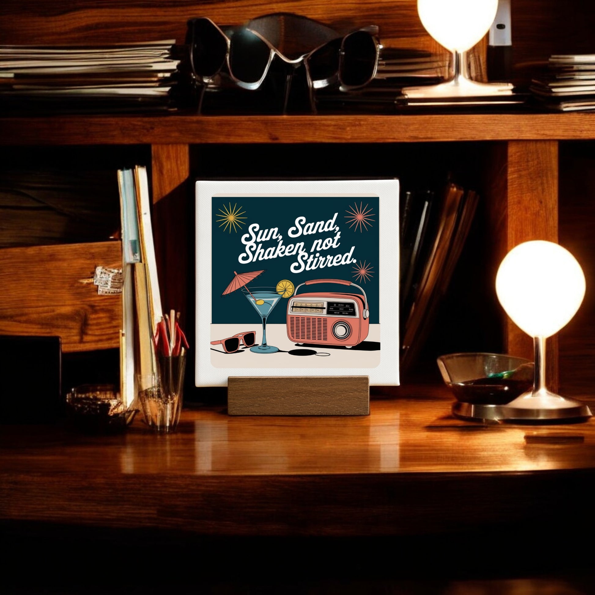 The Mirabilia Boutique MCM Sun, Sand, Shaken Not Stirred Mini Canvas (4x4 Retro Sign) adds a playful cocktail vibe to your bar cart or mid-century modern decor.