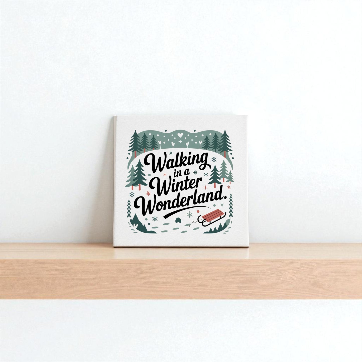 The Winter Wonderland Canvas (8x8) by Mirabilia Boutique features festive trees, snowflakes, and a red sled on a minimalist white background—perfect holiday decor to add seasonal charm to your shelf or wall.