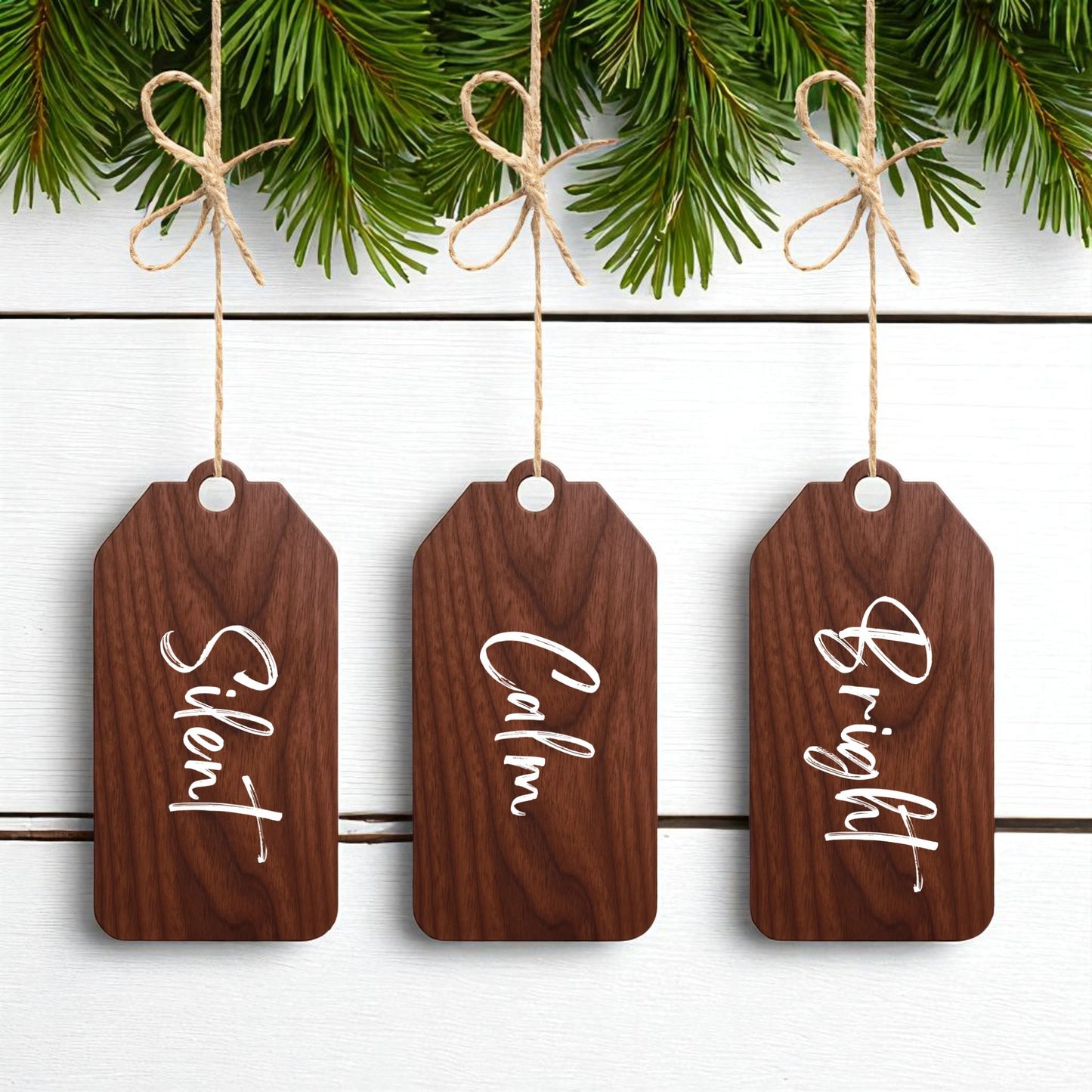 The Mirabilia Boutique Walnut Holiday Tags Set features "Silent," "Calm," and "Bright" in white script—perfect minimalist Christmas ornaments for your decor.