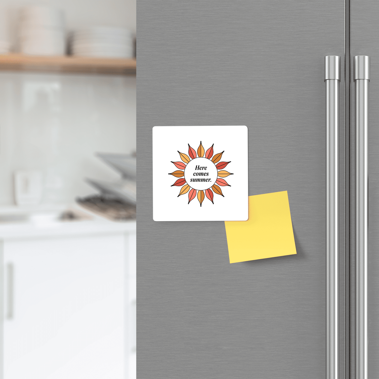 A refrigerator door features the Mirabilia Boutique "Here Comes Summer Magnet – Retro Sunburst Mini Art" with an orange and yellow sun design and cheerful text, next to a blank yellow sticky note. Blurred kitchen shelves with dishes are in the background.