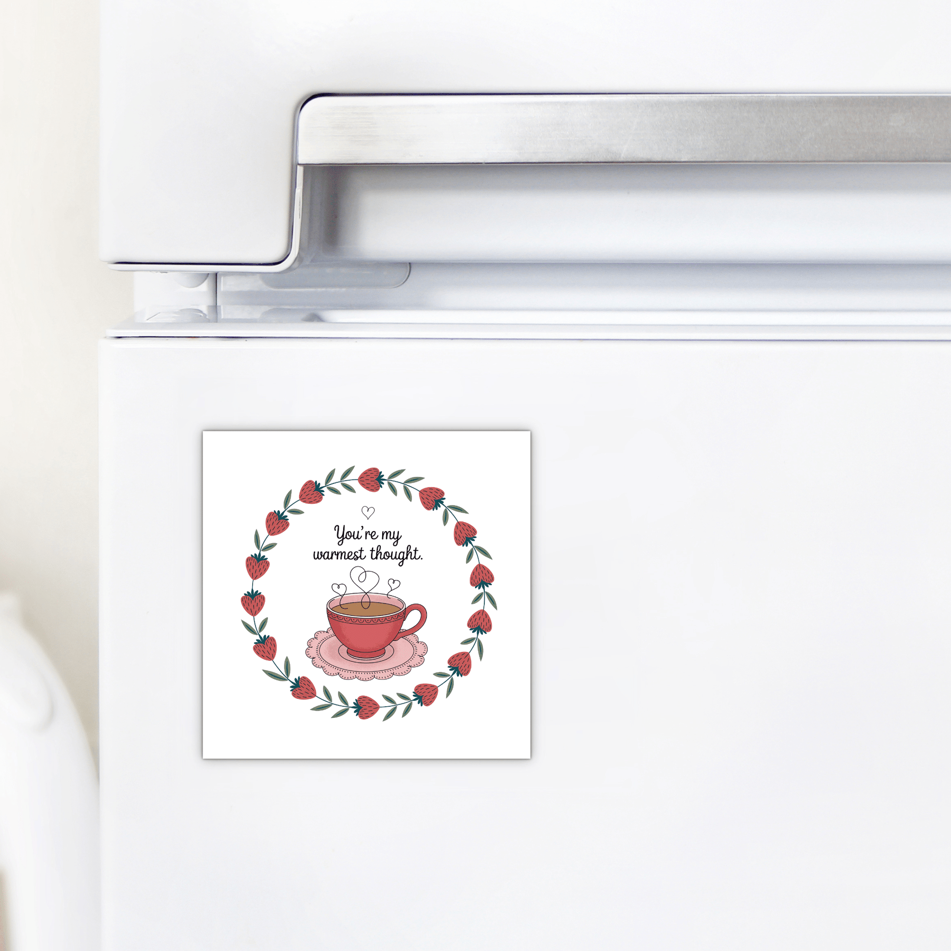 The Warmest Thought Tea Cup Magnet by Mirabilia Boutique features a red teacup with heart steam and a heart-leaf border. With "You're my warmest thought" text, it's an ideal Valentine’s Day or best friend gift for your fridge.