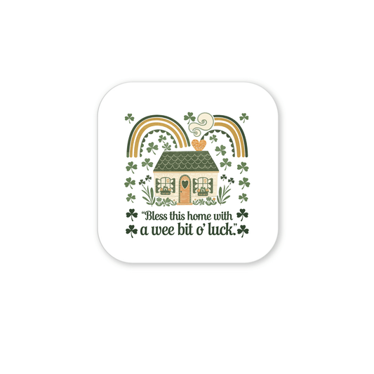 The Wee Bit o’ Luck Irish Home Magnet by Mirabilia Boutique features an Irish cottage with a green roof, shamrocks, rainbows, and heart-shaped smoke, plus the phrase “Bless this home with a wee bit o’ luck”—a charming Celtic decor accent.
