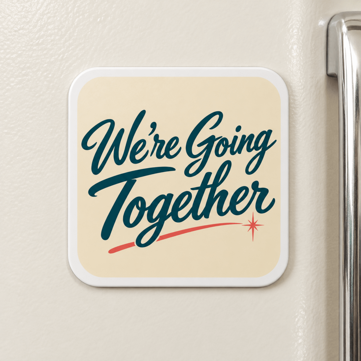 We’re Going Together Magnet | Chrome & Starlight: a square hardboard fridge magnet with rounded corners featuring dark green text above a red swoosh and starburst on a cream background.