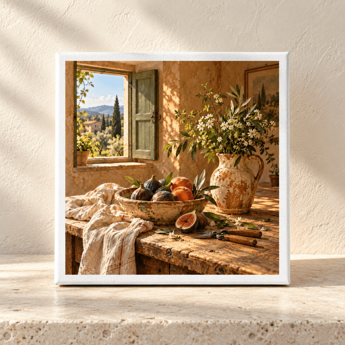 What the Garden Brought Canvas Art | Ochre & Cypress, a Tuscan still life featuring a rustic table with a bowl of figs and a pitcher of white flowers next to an open window looking out onto a sunlit landscape.