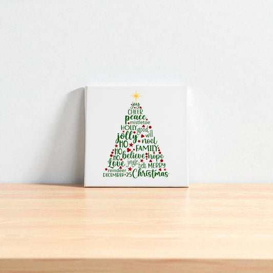 The Word Art Christmas Tree Canvas by Mirabilia Boutique features festive words in red and green forming a tree with a yellow star, adding holiday charm to your space. Available as 8x8 holiday decor, it's perfect for brightening up any room.