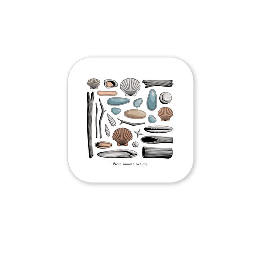Mirabilia Boutique’s "Worn Smooth by Time Magnet – Coastal Driftwood & Shell Art" features assorted seashells, driftwood, pebbles, sea glass decor, and stones in a square pattern on white. Text: "Worn smooth by time.
